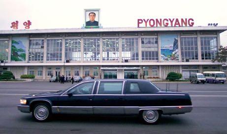Pyongyang, 2000: A limousine carrying the then US secretary of state Madeleine Albright passes a portrait of Kim Il-sung during her historic trip to North Korea.