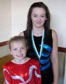 Both girls belong to the Abbey Road Acro Club of Wrexham. Olivia on L. and Dani on R.