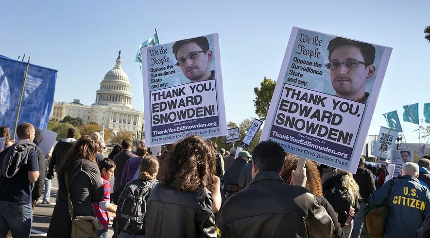 PRO/CON: Is Snowden a whistle-blower or just irresponsible? By McClatchy-Tribune News Service, adapted by Newsela staff on 02.04.14 Word Count 1,340 Demonstrators rally at the U.S. Capitol to protest spying on Americans by the National Security Agency, as revealed in leaked information by former NSA contractor Edward Snowden, in Washington, D.