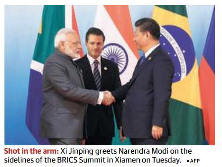 News Analysis Page-1,10,11- Modi-Xi meet fl ags forward looking ties,