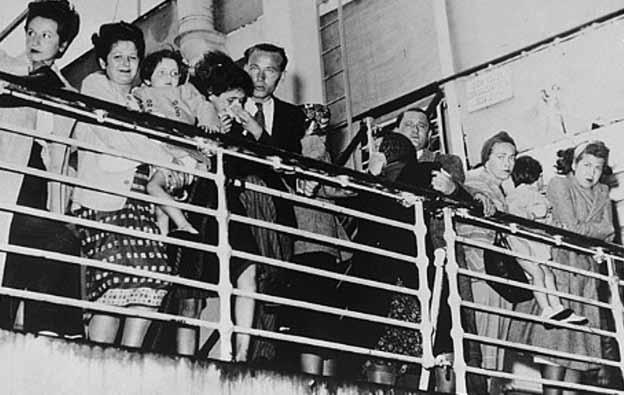 Denied entry to the United States, these European refugees line the deck of their ship during a refueling stop. (U.S. Holocaust Memorial Museum, courtesy of Wide World Photo) refugees.