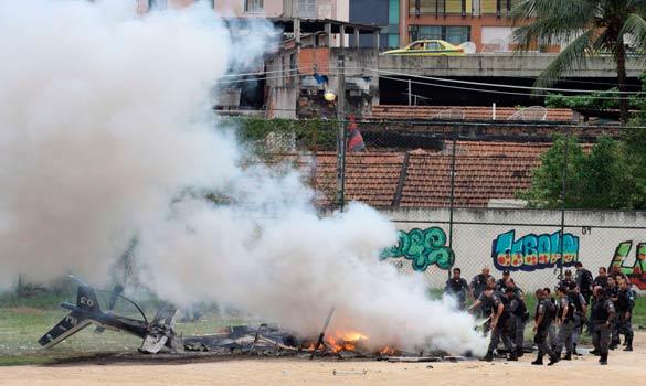 Rio, October 2009, gangs shot down a police helicopter above a favela (slum) Anyone else around take on the gangs?