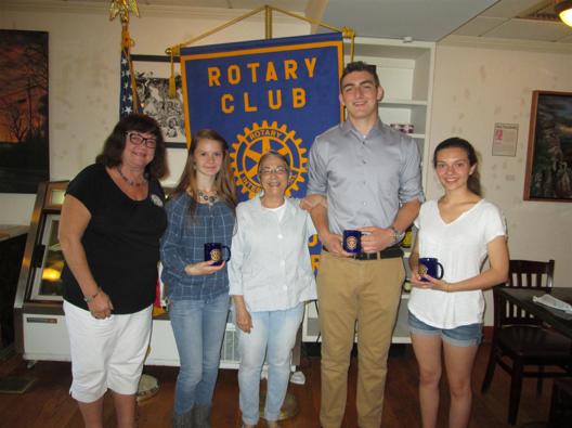 Germantown High School, Rotary President Susan Simon, Patrick Comerford of Red Hook High School, and