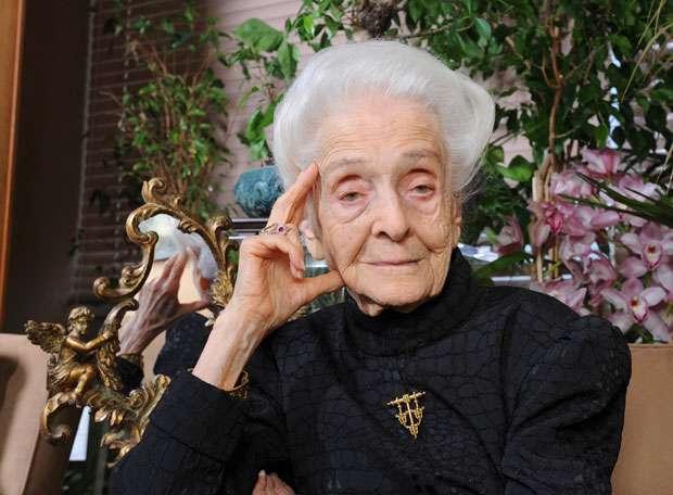 She was born in 1922, she is a famous astrophysicist and she is interested in science and astronomy, too.