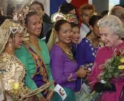 Photo: CP (Frank Gunn) Members of the Filipino-Canadian community greet Queen Elizabeth II in Toronto, during her 2002 tour of Canada.