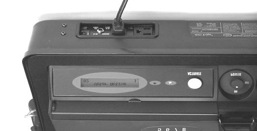 1. Note the serial number and the time displayed on the Voting Machine. 2. Insert the Voter Card in question into the Card Activator. 3. Press the Status button.