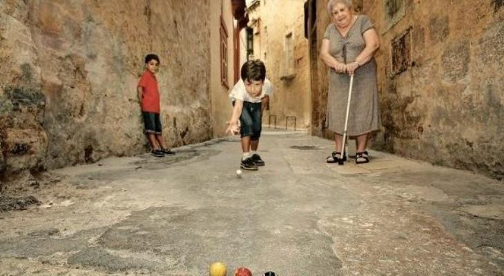would come out into the streets and play. The Maltese lifestyle was very different to what we know today.