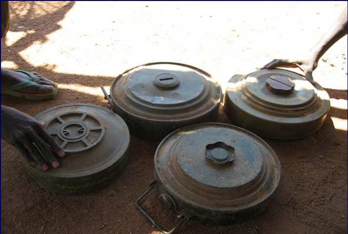 Mines 1/2 A landmine is usually a hidden weight-triggered explosive device which is intended to damage a target by means of a blast and/or fragment impact.