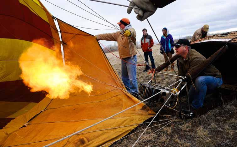 PRESSPASS Best Lifestyles Photo Division 5 2016 Better Newspaper Contest By Thom Bridge, Independent Record Page 1 Titled: Heating up the balloon The image came to life from pure journalistic