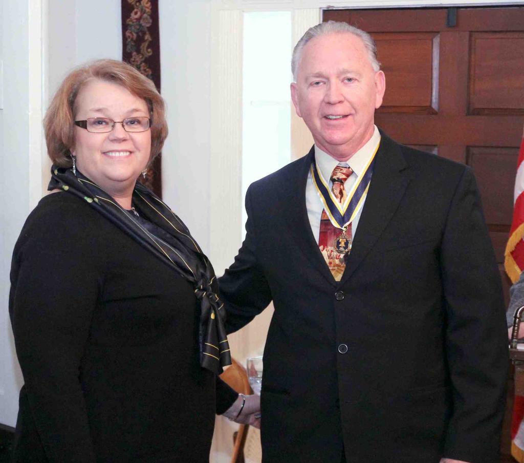 President Tom Geimeier and wife Mary Glen Newman receives the
