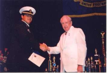 Baimonte at Thunderbird High School. Ron Green presented a medal to Frank V.