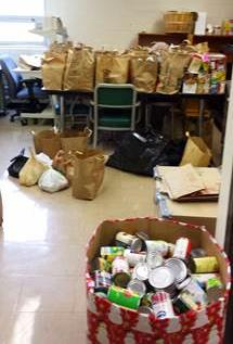 TR s National Honor Society collected over 1,000 can goods and over $100 cash donations for their annual food drive.