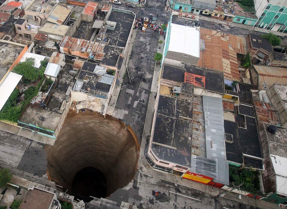 The sinkhole caused by the rains of Tropical Storm Agatha in Guatemala City is estimated to be 30 meters wide and over 60 meters deep.