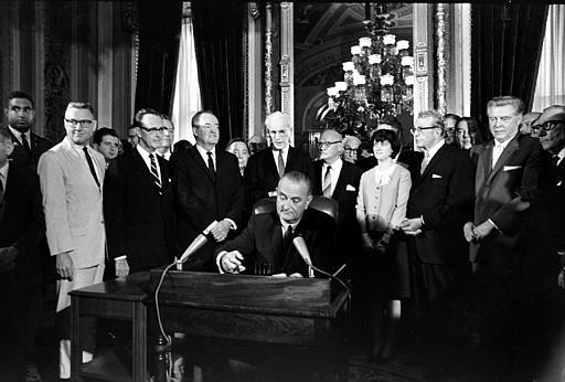 August 6, 1965: President Lyndon B. Johnson signs the Voting Rights Act of 1965.