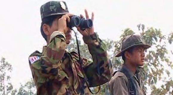 The Mon Forum (Issue No. 7/2009, July, 2009) 5 Two DKBA privates from Battalion No. 907 are seen observing the area.