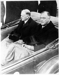 What was the major difference in approach to solving the economic crisis between Hoover and FDR? Revolution or Evolution? Critics: a. Deficit spending unbalancing the budget b.