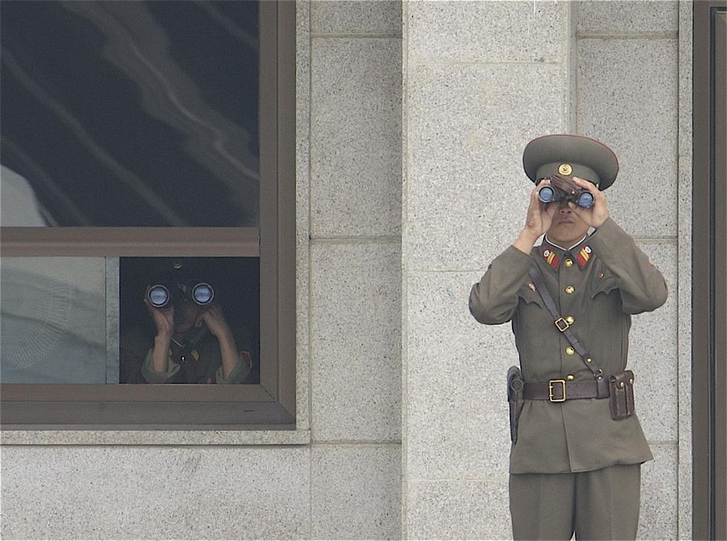 8 By Edward N. Johnson, U.S. Army. North Korean soldiers look south across the DMZ. South Korea s President Kim Dae Jung for his policies. In 2000 he was awarded the Nobel Peace Prize.