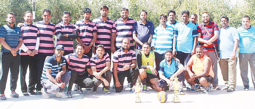 SPORTS 40 Left to right: Participating team pose for a group photo during the IGC s 3rd annual Volleyball tournament.