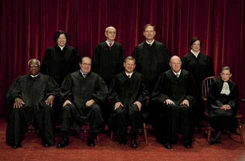 U.S. Supreme Court Front row: Associate Justices Clarence Thomas, Antonin G. Scalia, John Paul Stevens, Chief Justice John G.