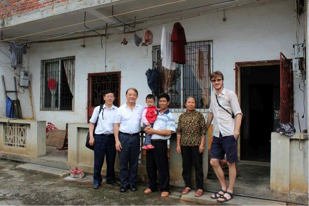Picture 9: Showing the front of one of the fishing families home in Lishi fishing village. The picture was taken right after the interview was done. To the very left are Prof. Cai and then Prof.