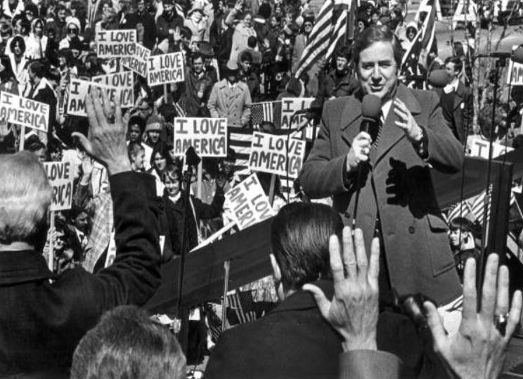 Jerry Falwell, pictured above, holding the microphone, a televangelist, urged Evangelical and Fundamentalist Christians to support the Republican Party.