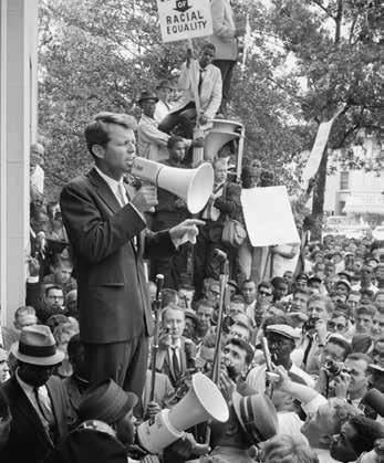 Kennedy speaking at a racial equality demonstration outside the Justice Department on June 14, 1963.