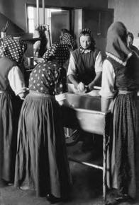 Hutterite Society Cooperation is valued in Hutterite society, where community members worship, work, and eat as a group.