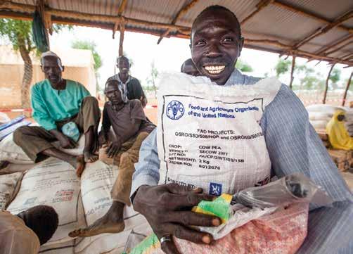 SOUTH SUDAN Refugee Al Tash Almak, from Bau, in the Blue Nile state, shows the seeds that he received in Yusuf Batil refugee camp, Maban.