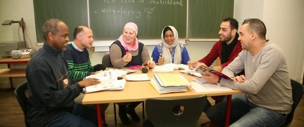 people with migrant background open institutions, such as libraries, to new users meeting at the senior