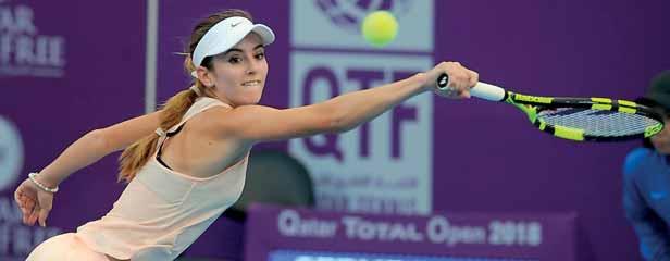 defending champion Karolina Pliskova in straight sets to reach the quarterfinals at the Qatar Total Open.