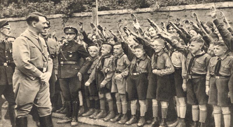Hitler started the Hitler Youth program in Germany to indoctrinate