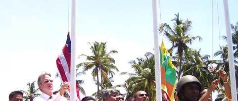 TSUNAMI RECONSTRUCTION - Update USAID/Sri Lanka Economic Growth Office Director Dick Edwards raises the American flag at the commencement of the Pottuvil Water Project SRI LANKA FINAL SRI LANKA