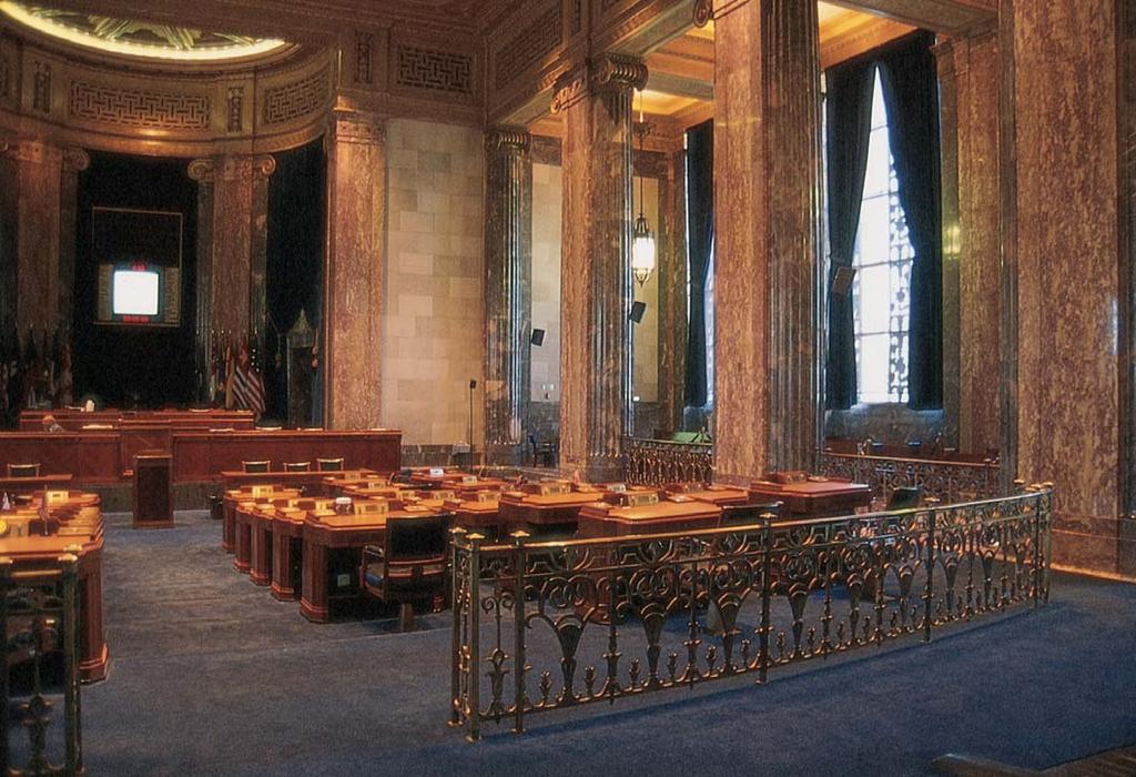 Above: The state senate chamber has been the scene of many political debates. The state house and senate chambers are at opposite ends of the Capitol lobby.
