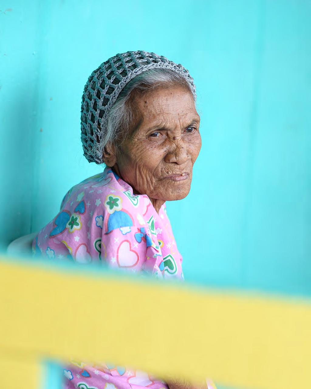 Buhaini Dimsian is over 70 years old and shares a room in a sports centre bunkhouses with her three granddaughters in Zamboanga,