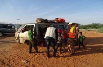 DRC team receiving returnees at the WS
