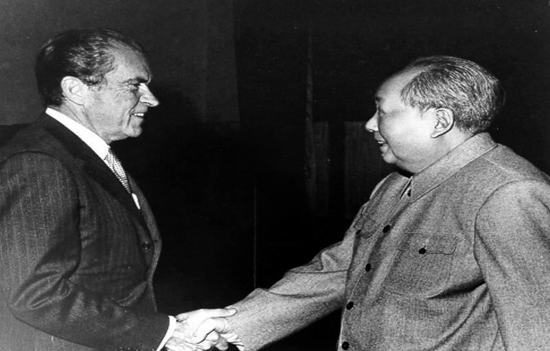 President Richard Nixon shaking hands with