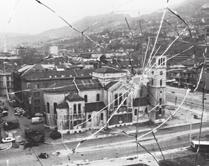 A view of downtown Sarajevo through a bullet-shattered window 622 Chapter 19 (tee mee SHWAH rah). The army killed and wounded hundreds of people.