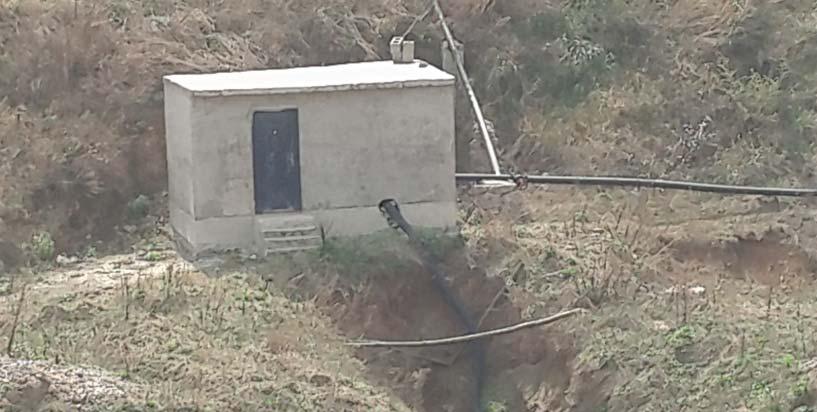 Figure 5-7 Temporary Drinking House Built by Haihe Company for Xiafang Village In April 2013, an LA announcement was published in Xiaoshan Village.