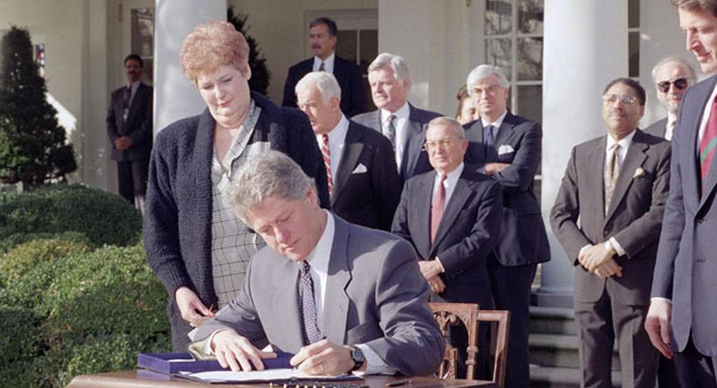 Bill Clinton signing the Federal Medical