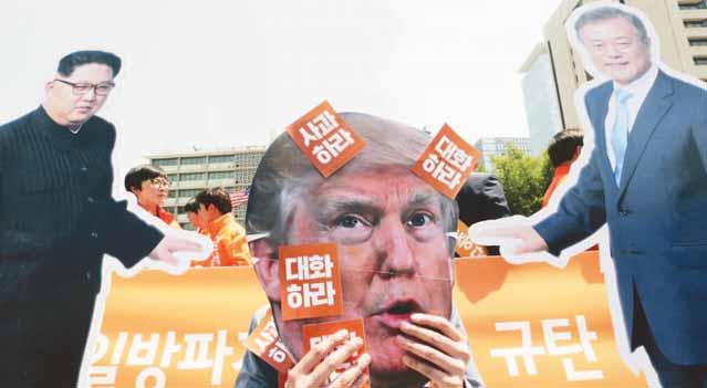 world 11 North Korea open to US talks any time despite Trump axing summit AFP n SEOUL orth Korea said on Friday Nit is willing to talk to the United States at any time after President Donald Trump
