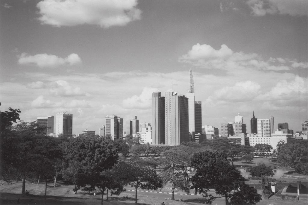 (b) Study Figure 6(b) which is a photograph taken from Nairobi Hill.