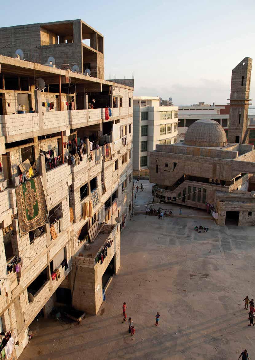 Syrian refugees living in a half-finished mosque and university in Lebanon.