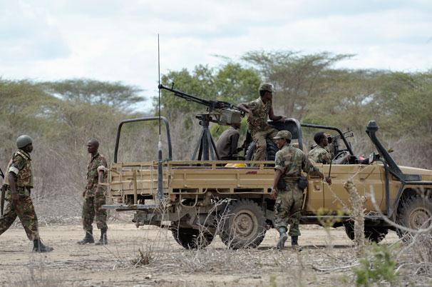 Soldiers of the Transitional Federal Government on patrol inside Kenya near the Somali border.