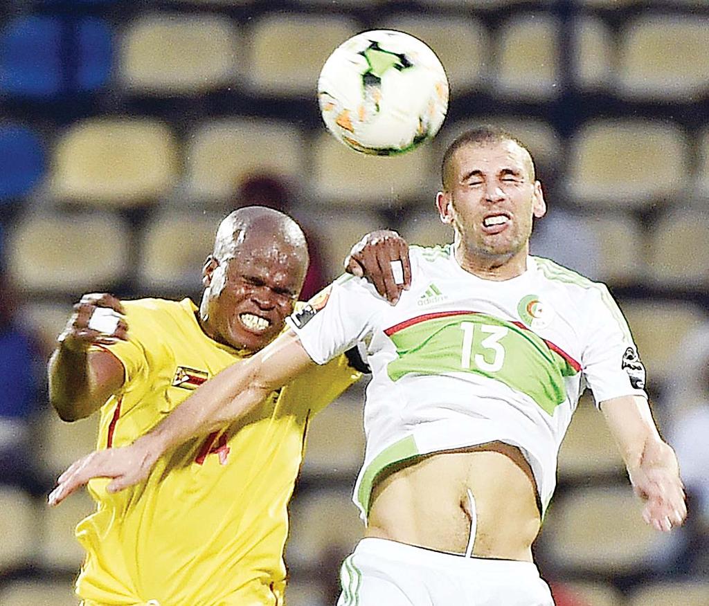 SPORTS 42 Mahrez scores twice but Algeria held by Zimbabwe Burkina Faso fight back to hold Cameroon FRANCEVILLE, Gabon, Jan 15, (AFP): Riyad Mahrez scored twice but Algeria had to settle for a 2-2