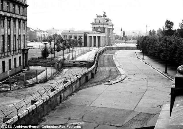 Later (1961), the Berlin Wall was constructed physically separating