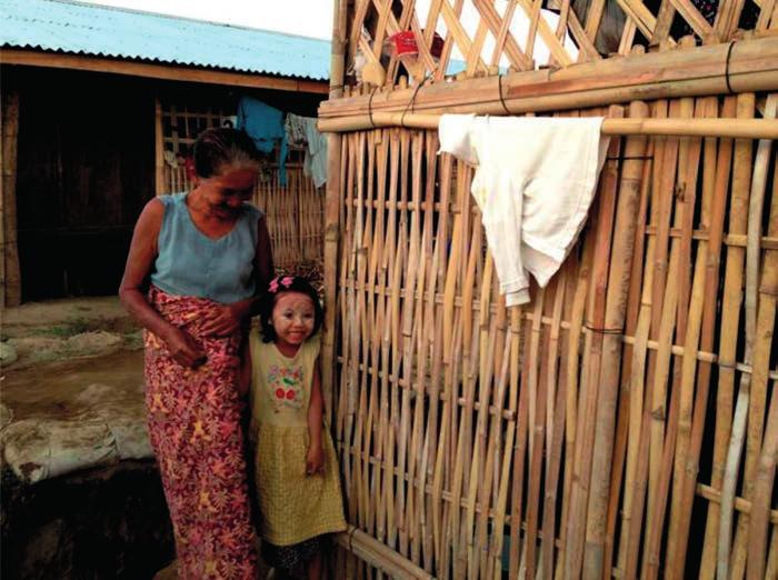 Each longhouse-style shelter can accommodate eight families. Kyaw Hla, 58, is the camp administrator at Hpwe Yar Kone camp and lives in a government-built longhouse with 20 of his family members.