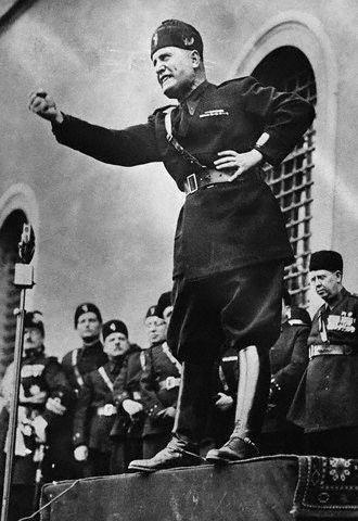 From the turmoil came Benito Mussolini Socialist in youth rejected it later 1919 organized veterans & other discontents into