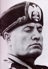 Rise of Fascism in Italy In October of 1922, Mussolini marched on Rome with thousands of followers known as the black shirts Benito Mussolini