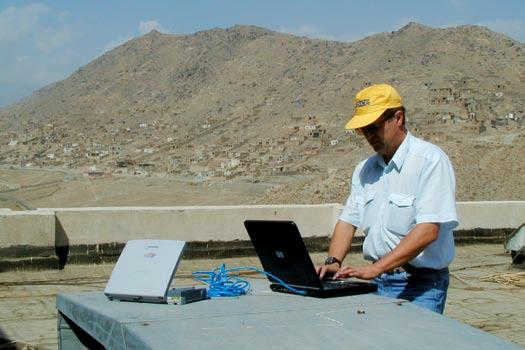 132 133 Brian Steers Baptism of Fire for IRMA: the Yellow Laptop in Kabul, Afghanistan, as OSCE Communications Officer Victor Kryshevich logs on via satellite during the October 2004 presidential