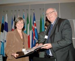 38 39 OSCE/Ayhan Evrensel Bruce George hands over the 2004 OSCE Journalism Award to Ann Cooper, Executive Director of the Committee to Protect Journalists.